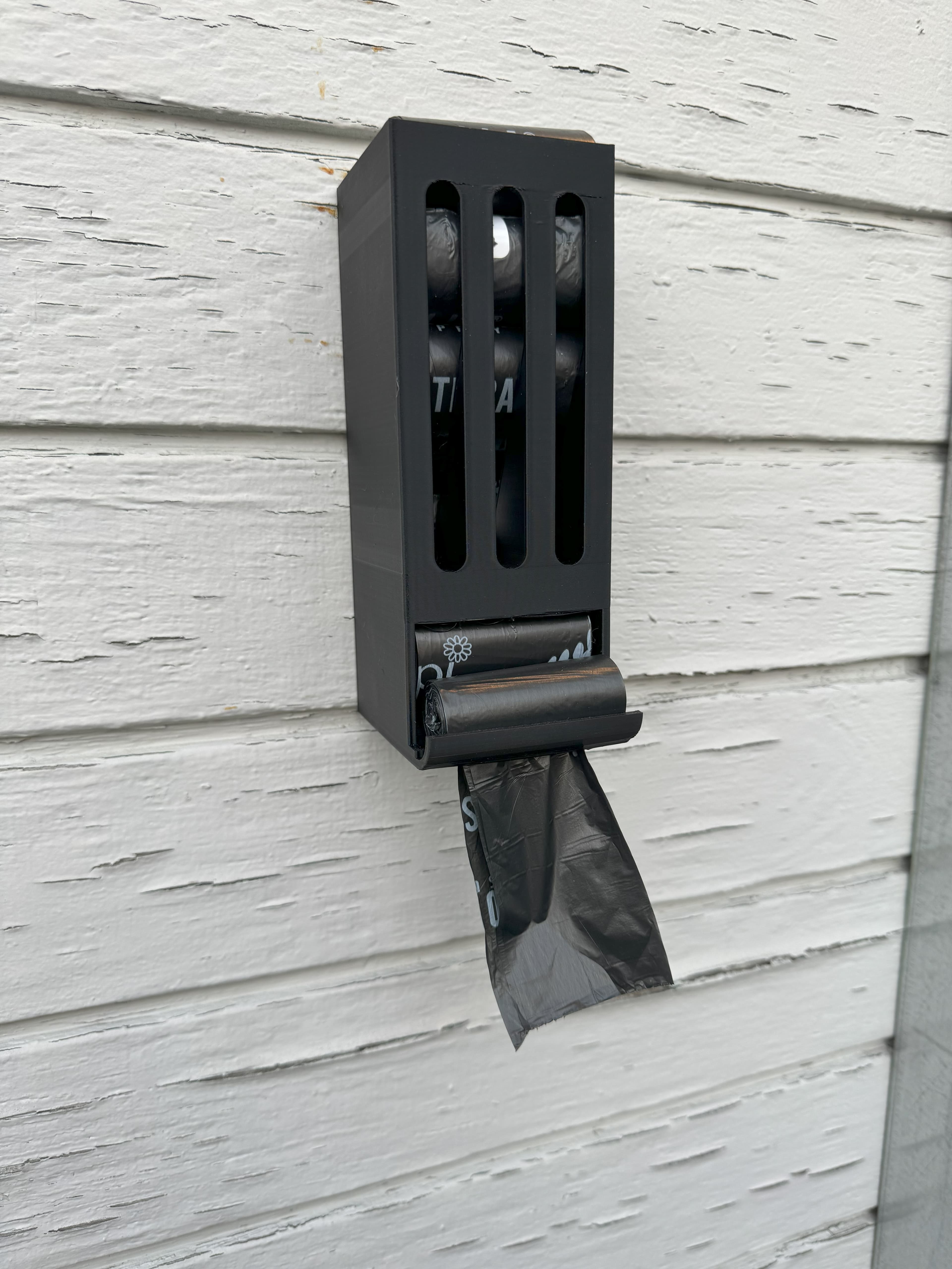 Suporte/dispenser de sacos para cocô